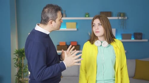 Dad Talking To Teen Daughter and Hugging