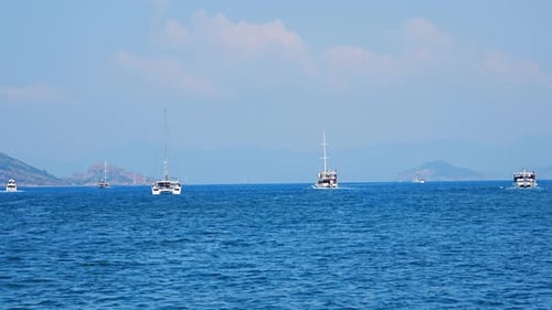 Boats Leaving the Marina Towards the Open Sea in the Morning