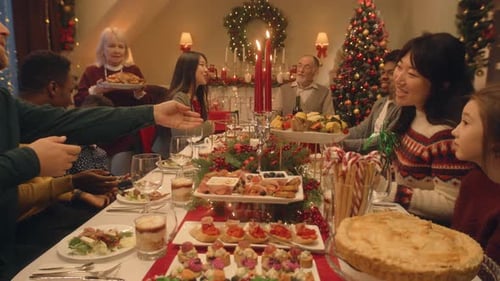 Large Family Celebrates Christmas Dinner Together