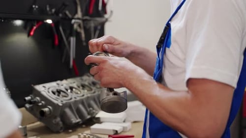 Professional Mechanic Assembles Engine Components Fits Pistons Installs Rings Liner Kit Auto Repair