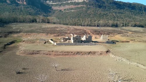 Sau swamp dike in Catalonia, Spain, intense drought in 2024 Views of a village that is normally subm