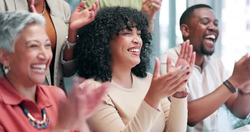 Diverse Team Applauding Success in Workplace