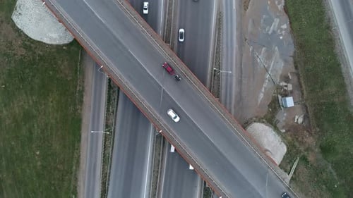 Aerial Top Down View of Highway Interchange Junction Road with Traffic Shot with Camera Rotation