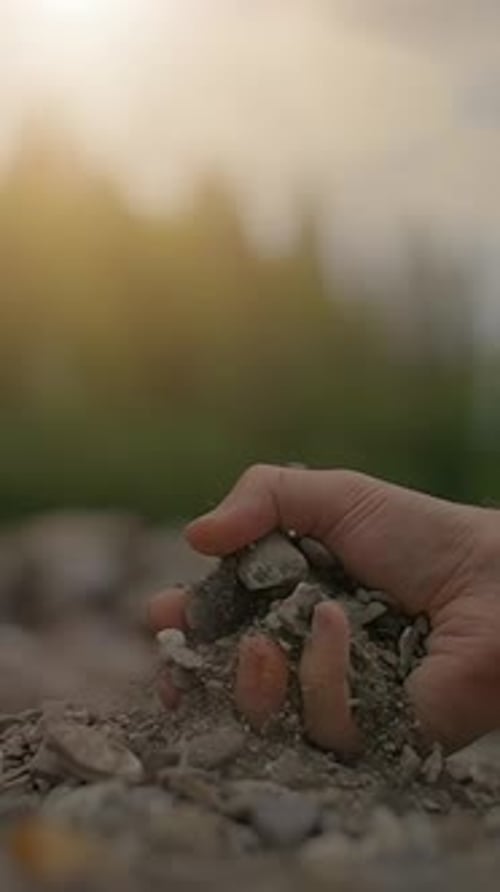 Hand Grasping Soil in Nature A Deep Organic Connection with Our Earth and Environment