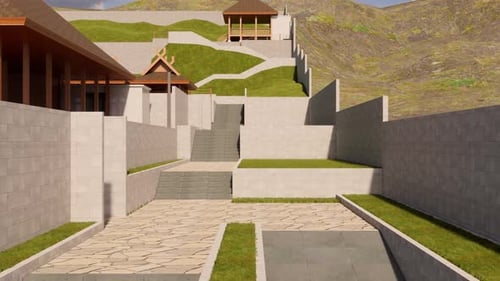 Área al aire libre con escalones del edificio y zonas verdes.