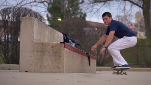 person does a halfcab heelflip nose slide at the skatepark
