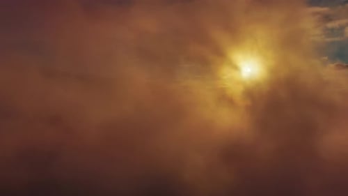 Aerial View of Orange Fluffy Cloud in Sky