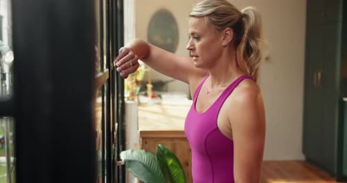 Woman Taking a Break After Exercising at Home