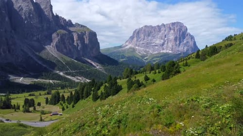 Breathtaking Panorama of Gardena Pass Illuminating the Dolomites in Summer