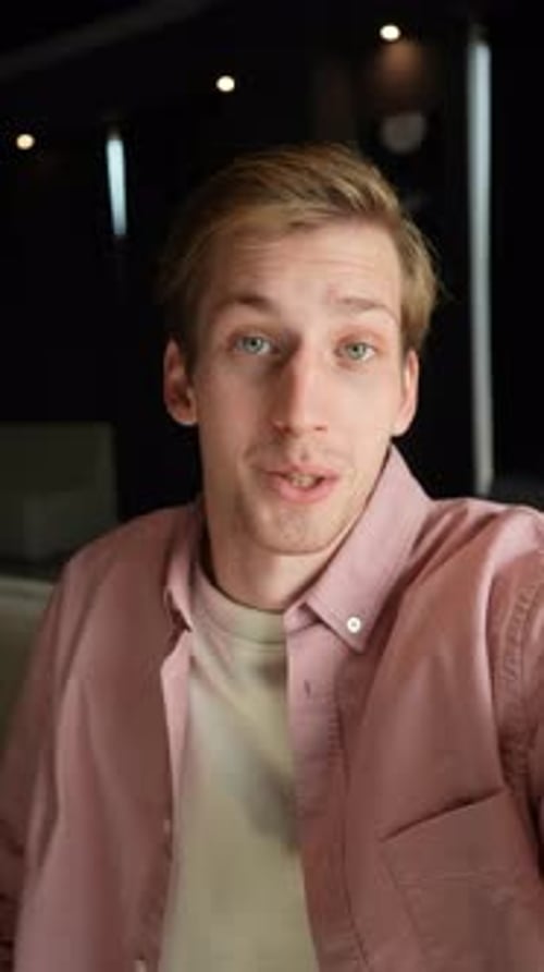 Young Man Speaking Directly to Camera in Portrait