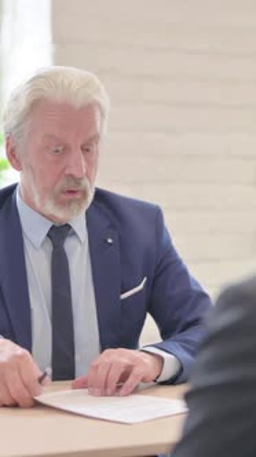 Senior Old Businessman Discussing Work with Businessman in Office, vertical video