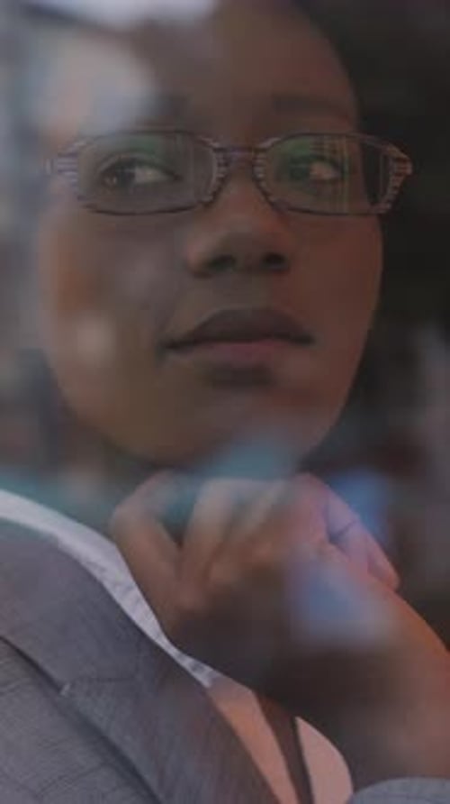 Business Woman Sitting at Cafe