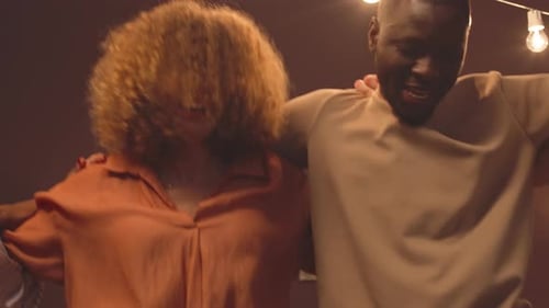 Friends Dancing and Celebrating at Birthday Party