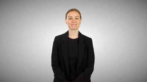 Attractive Business Woman Nodding Head in a Yes gesture in a Studio