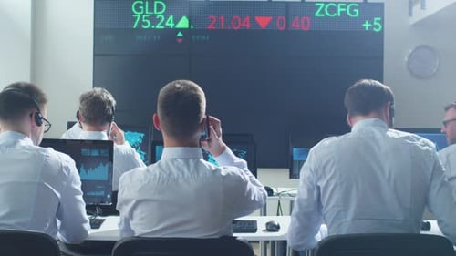 Busy Stock Trading Floor Office Workers Analyze Market Data