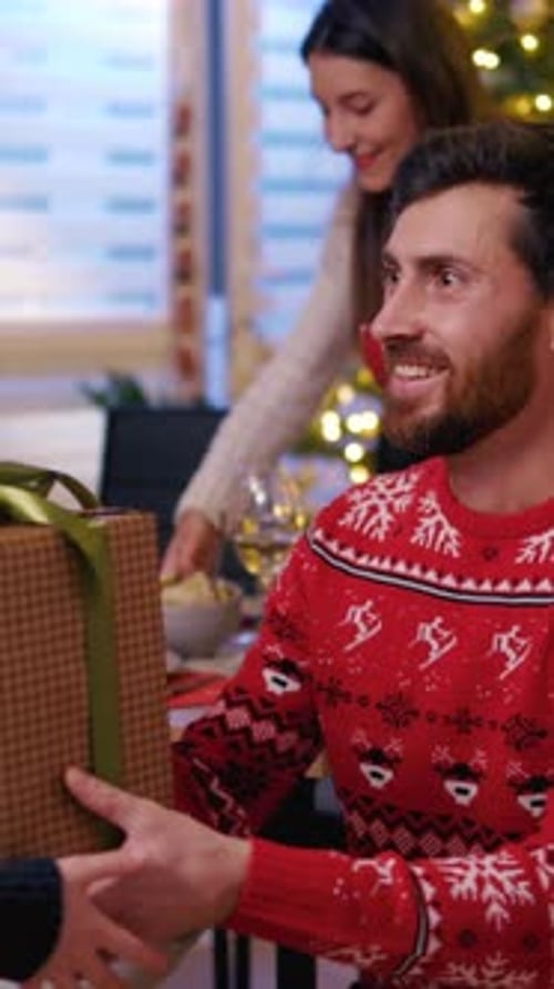 Dad Receives Gift and Hug from Daughter