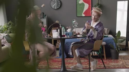 Queer Men in Silk Robes Doing Makeup and Chatting at Home