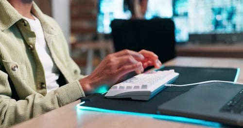 Hands, keyboard or coding with connection in office, productivity and programmer for gaming on neon
