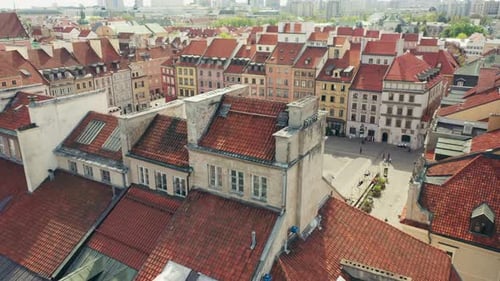 Tiled roofs of old houses on the market square of the Old Town in Warsaw.