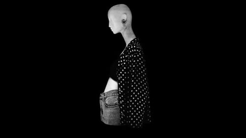 Retro Black and White Mannequin Rotating with Polka Dot Jacket