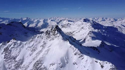 Aerial flight above stunning Alps.