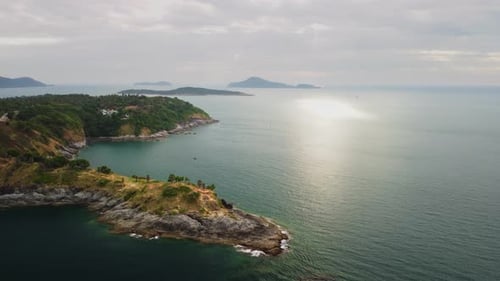 Amazing Landscape of Rocky Islands with Cape Going to Sea Filmed By Drone at Summer Day