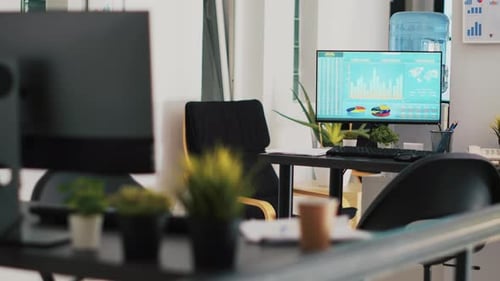 Empty Modern Office with Desks and Computer Screens