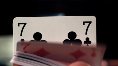 Shuffling Deck of Playing Cards Close Up