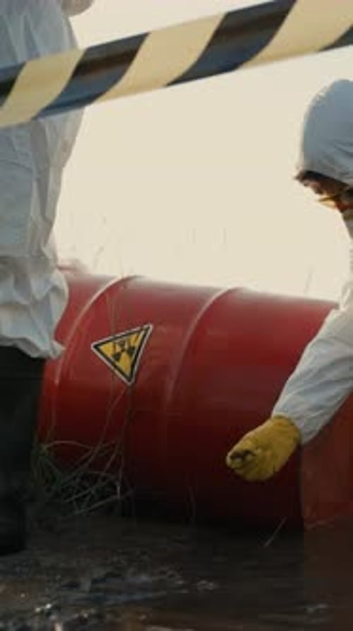 This Area is Hazardous Due to a Chemical Drum Needing Specialized Protective Gear