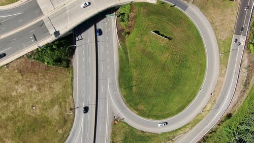 Top down overhead aerial of traffic on roads, overpass bridge, travel transportation fuel prices, ho