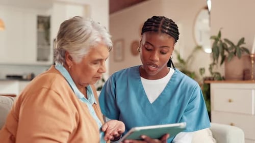 Senior Woman Receives Medical Advice at Home