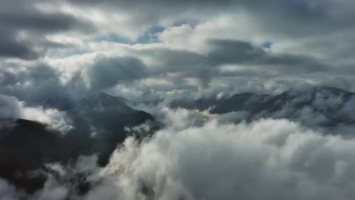 Aerial High View of Dramatic Clouds Flying
