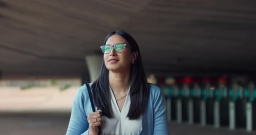 Woman, walking and employee thinking with morning, commute and travel with smile under bridge