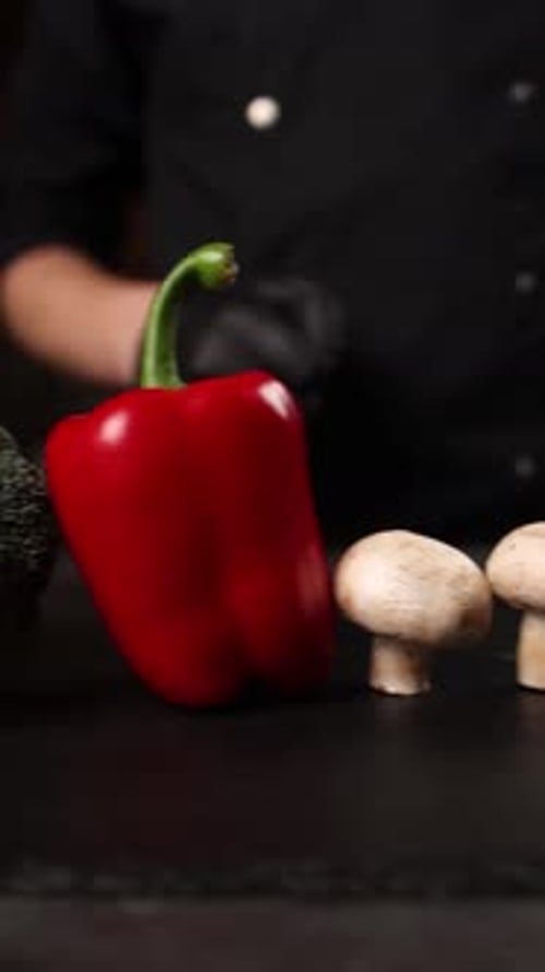 The chef prepares a vegetable dish.