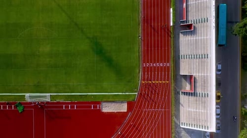 Cinematic drone shot of running track in the city of Playa Del Carmen Mexico