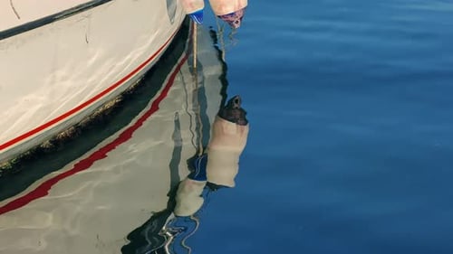 Wooden Boat On The Calm Sea Water 4