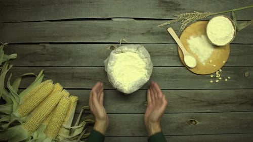 Corn and cornmeal on the table. Flat lay.