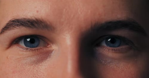 Extreme Close-Up of Person's Face and Blue Eyes