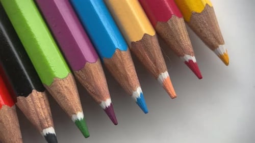 Brightly Colored Pencils Lined Up Close Up