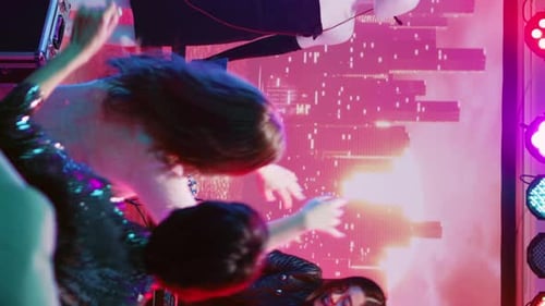 Singer Performs With Dancers at Nightclub Concert