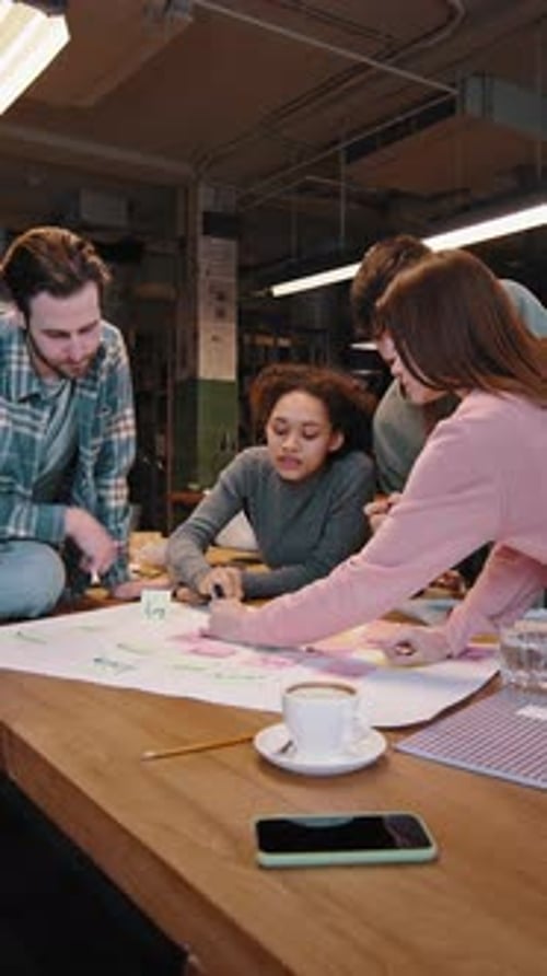 Team Collaborating on Project with Sticky Notes