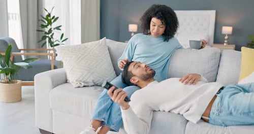 Couple Relaxing Together on the Couch at Home