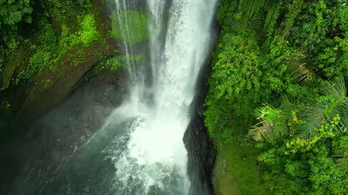 Aerial Drone View of Beautiful Aling Aling Waterfall in Nothern Bali Indonesia