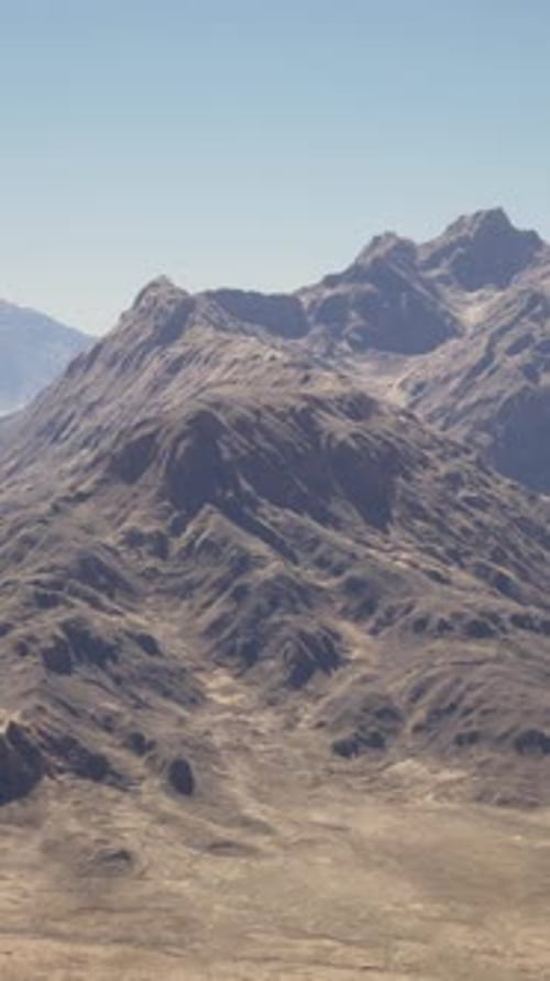 An Aerial View of a Mountain Range in the Desert
