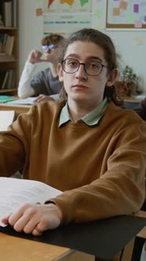 Vertical Portrait of Teenage Schoolboy at Health Education Lesson