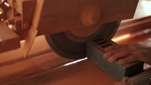 Cutting Concrete Block with Circular Saw at Construction Site