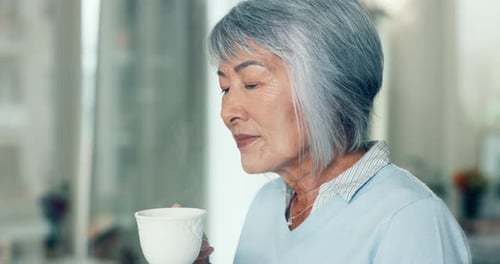 Home, peace and elderly woman with coffee, retirement and relax with wellness, lounge and memory