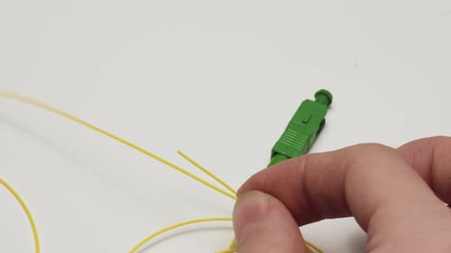 optical fiber welding workflow, optical fiber stripping, close-up