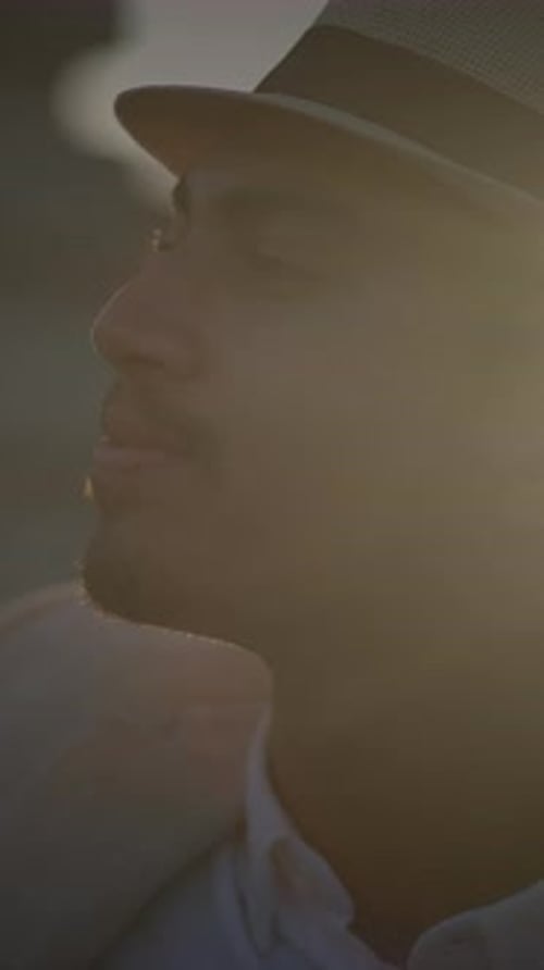 Attractive Man in Fedora Looking into Distance
