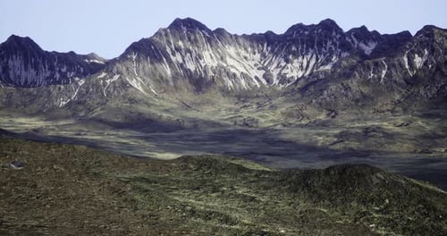 Breathtaking Mountain Landscape with Snow Capped Peaks During Daylight Hours